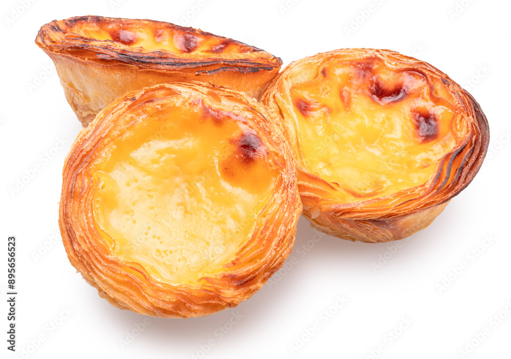 Pastel de nata or traditional Portuguese egg custard tarts on white background. Pastel de nata or traditional Portuguese egg custard tarts on white background.