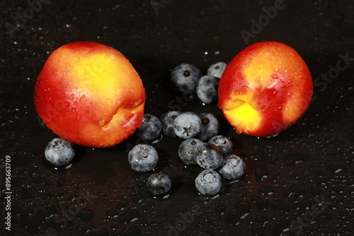 fresh nectarines in water drops	Palette with paints and canvases.
 photo