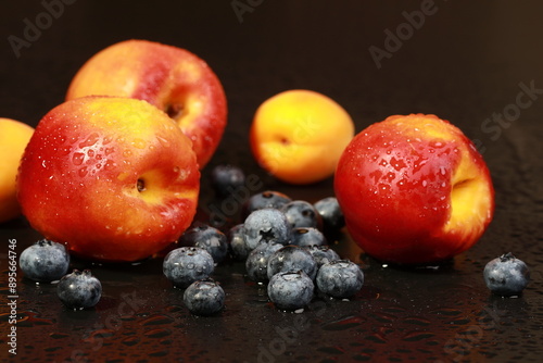 fresh nectarines in water drops	Palette with paints and canvases.
 photo