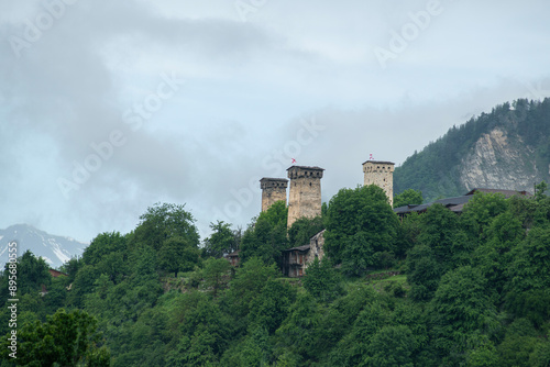 Mestia town in Georgia.
The medieval Svan Towers is a traditional fortified residence in Mestia, Georgia. Svan towers and structures surrounded by green colors. photo