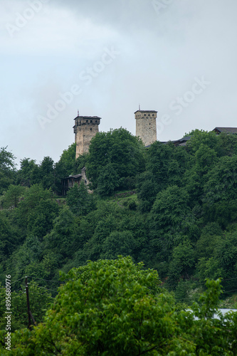 Mestia town in Georgia. The medieval Svan Towers is a traditional fortified residence in Mestia, Georgia. Svan towers and structures surrounded by green colors.