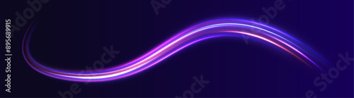 Long exposure, light painting photography. Vibrant streaks of neon blue and pink color against a black background. Night motorway with light effects in neon colors purple.	