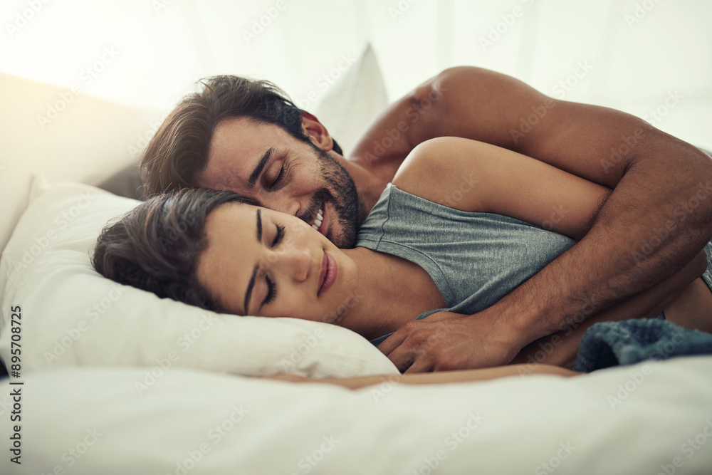 Happy, couple and sleeping together in bed for relax, morning and weekend or support for love. Man, woman and hug in home or apartment for trust and comfort or partner, dream and smile for connection Happy, couple and sleeping together in bed for relax, morning and weekend or support for love. Man, woman and hug in home or apartment for trust and comfort or partner, dream and smile for connection