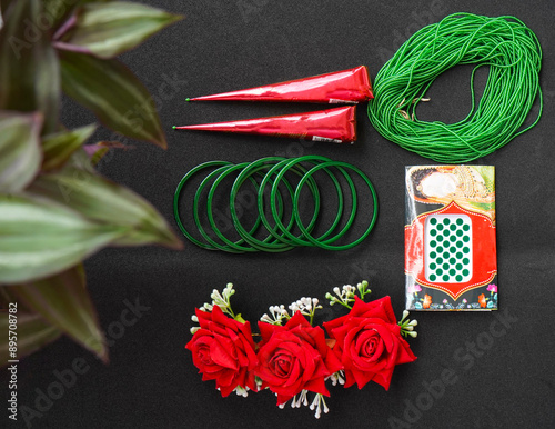 Shrawan Month Green Bangles, Mehendi Cones, Tika, Hair Flowers Gajra, necklace for Hindu Festival photo