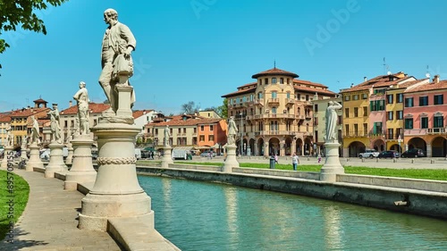 PADUA, ITALY - APRIL 17 2018: Statues of Pietro Danieletti with Gianbattista Morgagni, Rainiero Vasco, Francesco Morosini and Galileo Galilei. Prato della Valle is elliptical square in Padova, Italy. photo