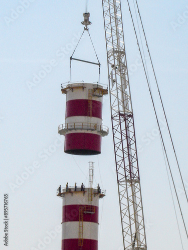 Hydrogen Refinery Under Construction with Prominent Chimney in the Foreground