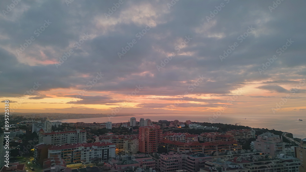 Obraz premium Drone coastal resort sunset. Aerial view stunning cozy city placed ocean shore
