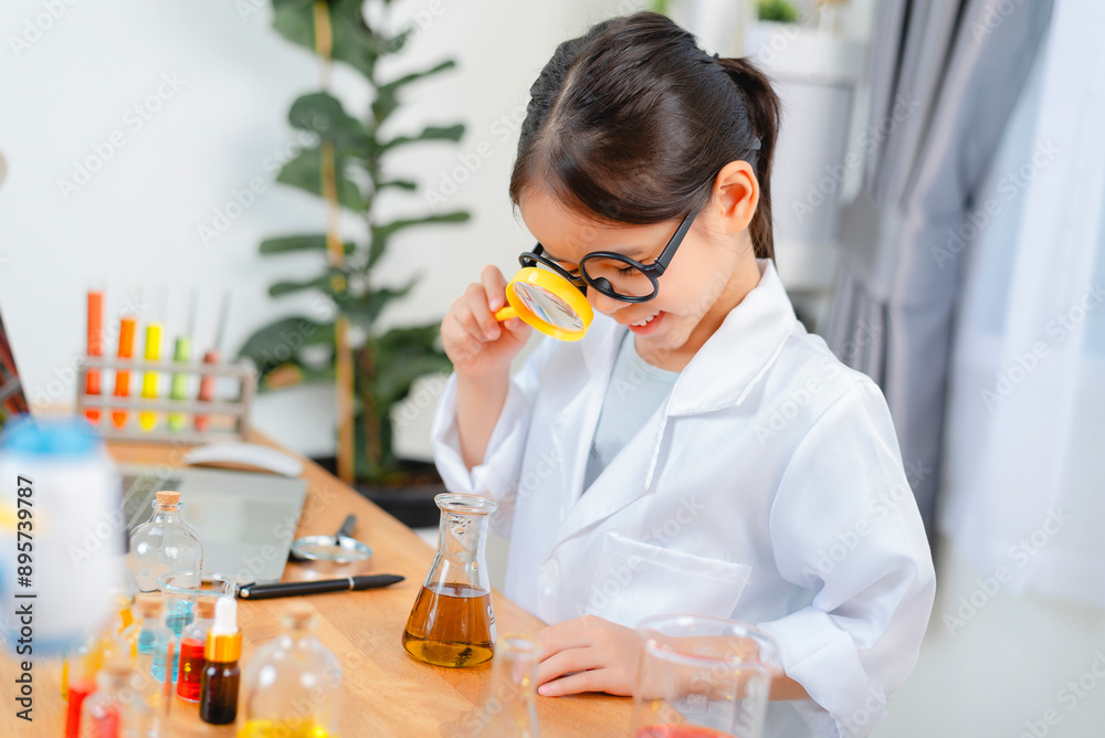 Young Girl Scientist Conducting Experiments in Laboratory Setting Young Girl Scientist Conducting Experiments in Laboratory Setting