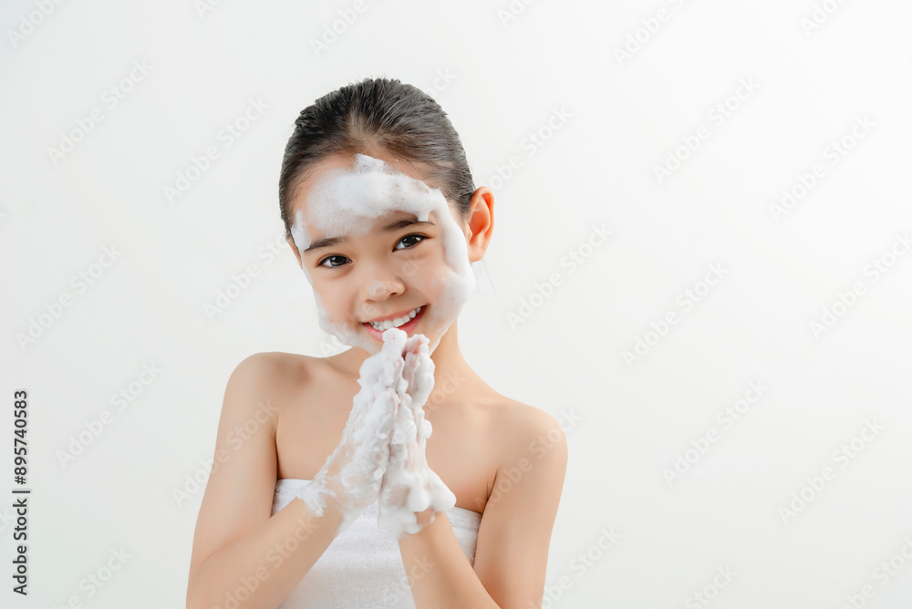 Adorable Girl Applying Facial Cream Smiling At Camera Adorable Girl Applying Facial Cream Smiling At Camera