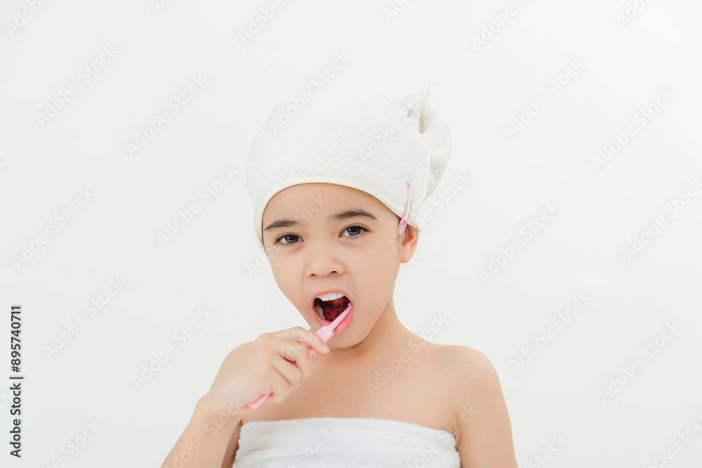 Smiling Child Brushing Teeth in Bathroom With Towel Wrap Smiling Child Brushing Teeth in Bathroom With Towel Wrap