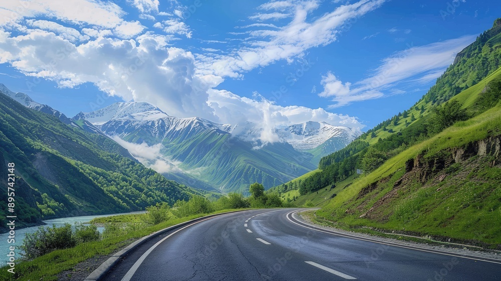 Road along the river in the Caucasus Mountains, with beautiful summer landscape in Georgia Road along the river in the Caucasus Mountains, with beautiful summer landscape in Georgia
