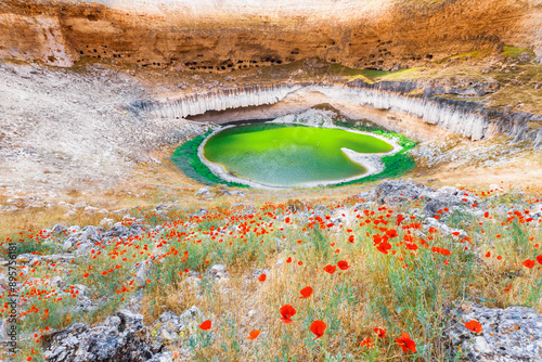 Çıralı Sinkhole is located in the Akviran Plateau in the northwest of Yenikent Sub-district of Konya's Karapınar district. photo