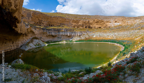 Çıralı Sinkhole is located in the Akviran Plateau in the northwest of Yenikent Sub-district of Konya's Karapınar district. photo