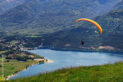 Paragliding in near lake Bohinj, Julian Alps, Slovenia. Paragliding in Slovenia near lake Bohinj, Julian Alps region photo