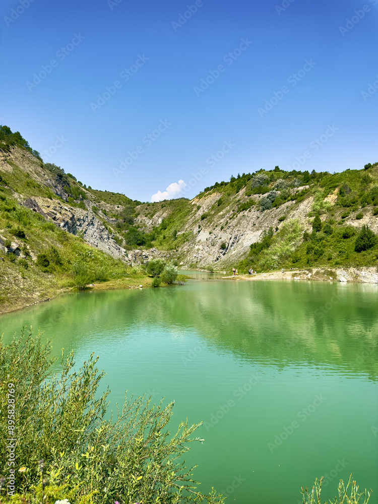 A wonderful landscape in the Carpathian mountains with a view of the lake between the rocks in sunny weather A wonderful landscape in the Carpathian mountains with a view of the lake between the rocks in sunny weather