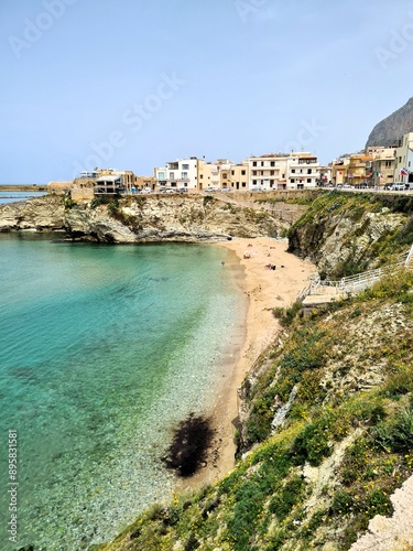 evocative image of a sandy beach in Sicily in summer