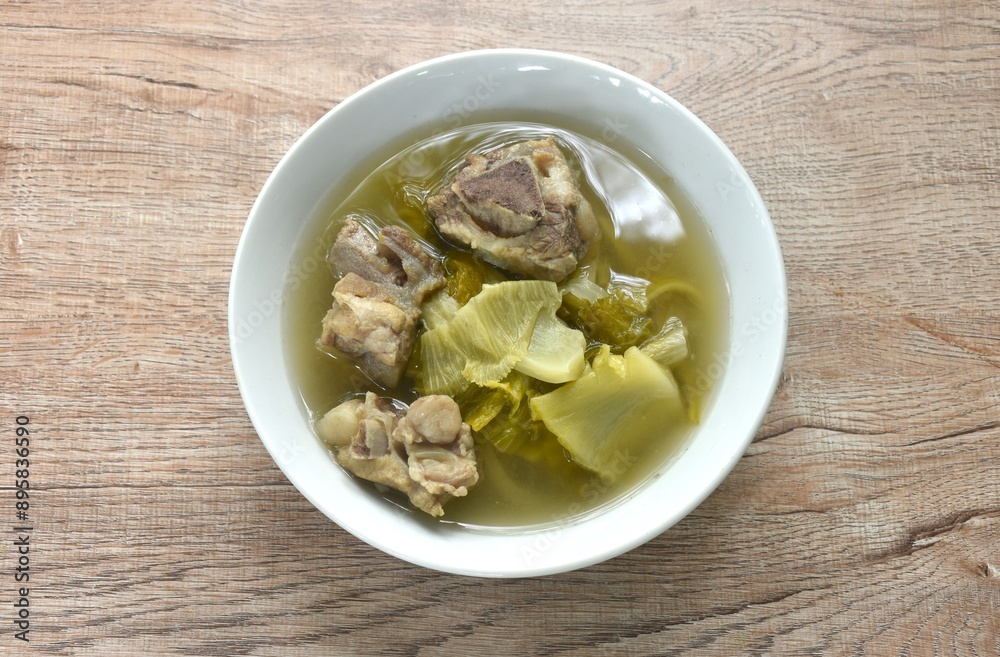 boiled pickled cabbage with pork bone in clear soup on bowl boiled pickled cabbage with pork bone in clear soup on bowl