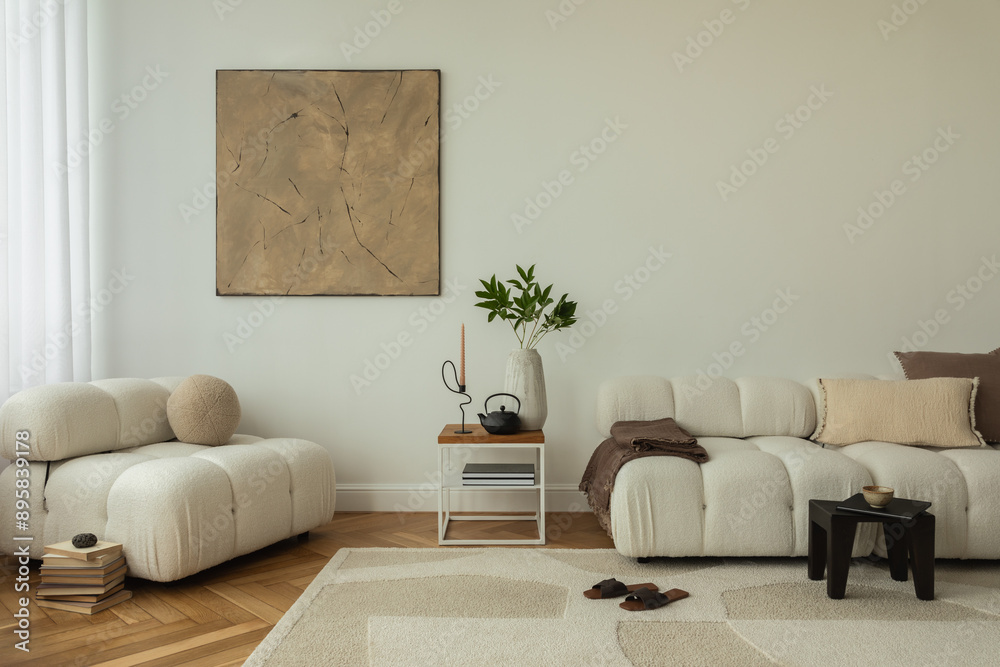 A modern living room interior featuring cozy, plush white sofas, a ...