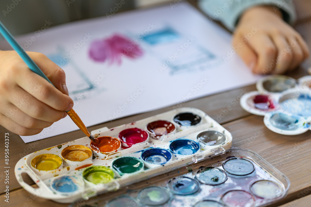 Child painting. A tool for preschool education or kindergarten. Designed for sensory and movement training. Montessori-type occupational therapy for autistic children. Child painting. A tool for preschool education or kindergarten. Designed for sensory and movement training. Montessori-type occupational therapy for autistic children.