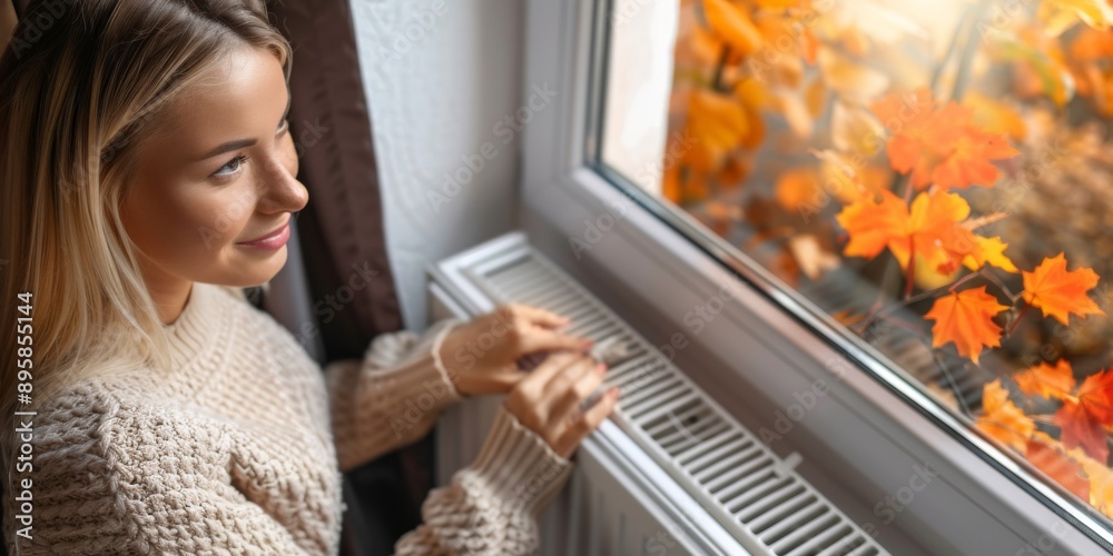 woman adjusting temperature on heating radiator. woman adjusting temperature on heating radiator.