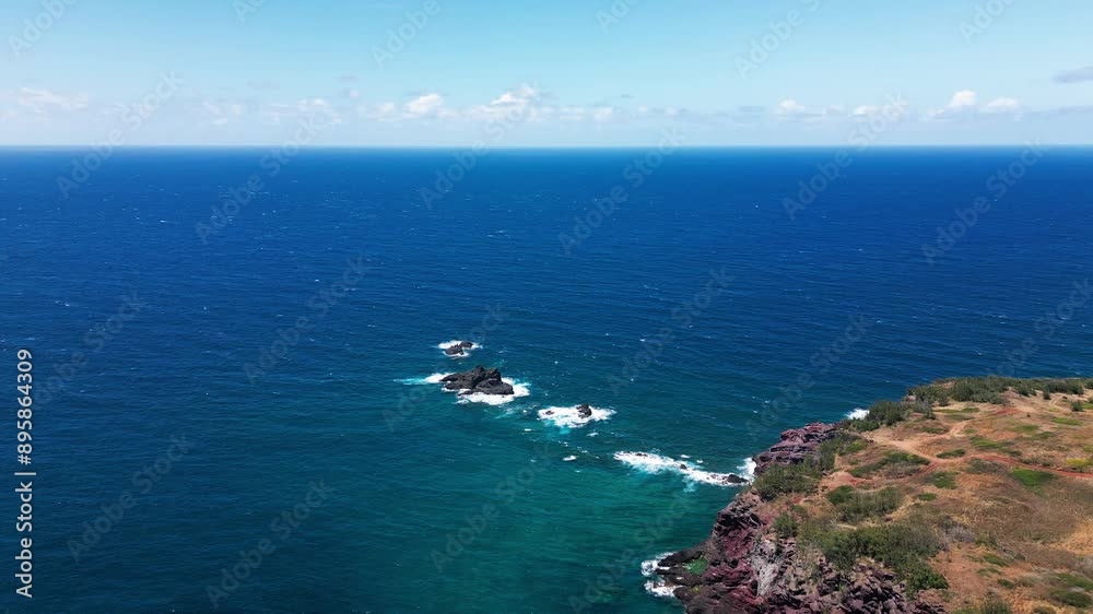 Close Up 4k drone shot of small rock formations on cliff outcropping into ocean in Hawaii Close Up 4k drone shot of small rock formations on cliff outcropping into ocean in Hawaii