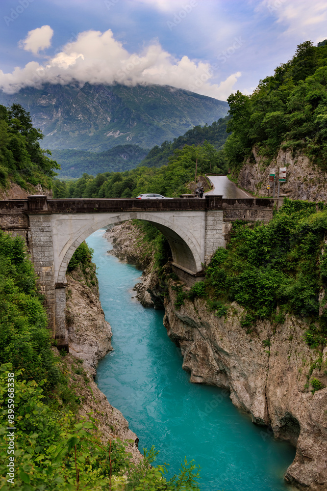 Historic Napoleon bridge over the Soca river near Kobarid, Slovenia.. Soca river near Kobarid village, Slovenia. Nice picture of Soca river near Kobarid village.