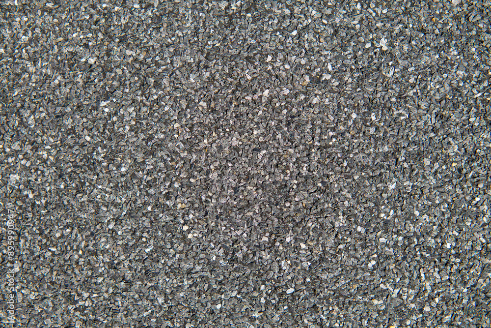 background, texture from tar paper. black and white patterns on a black background. background, texture from tar paper. black and white patterns on a black background.