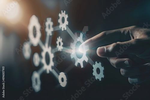 Finger directing towards digital cogwheel symbols, illustrating concepts of system integration, technology adoption, interactive interfaces, and process optimization.