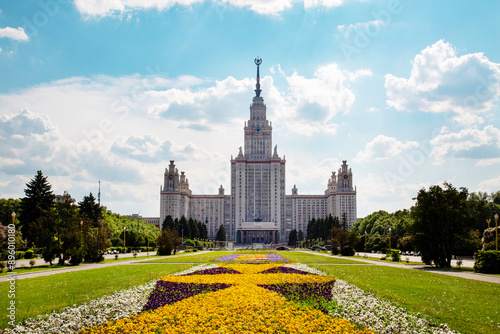 Photography The building of Moscow State University with beautiful flower beds on a clear sunny day