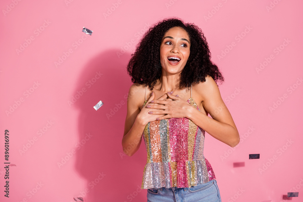 Photo portrait of lovely young lady touch chest amazed look empty space dressed stylish sequins garment isolated on pink color background Photo portrait of lovely young lady touch chest amazed look empty space dressed stylish sequins garment isolated on pink color background