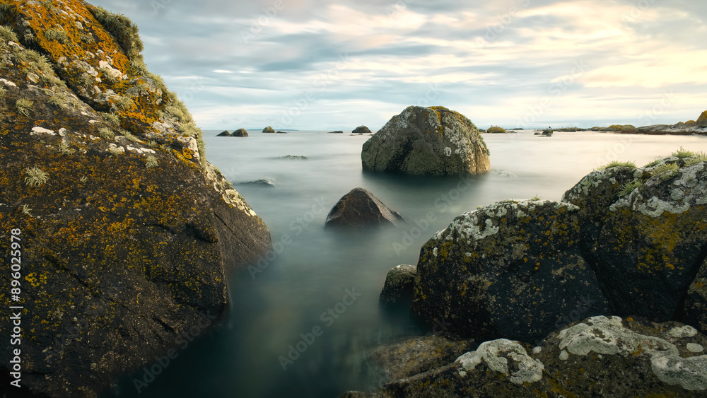 Beautiful coastal landscape scenery, rocky coast of wild Atlantic way at sunset, nature background, wallpaper, long exposure