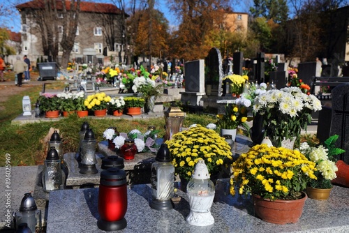 All Saints Day cemetery flowers in Poland