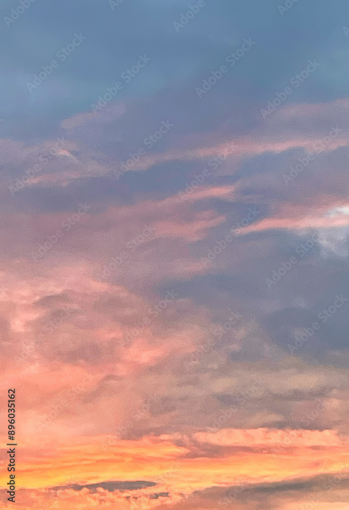 a light cloudy sky just before sunset shows a multi colored view of pink and orange a light cloudy sky just before sunset shows a multi colored view of pink and orange