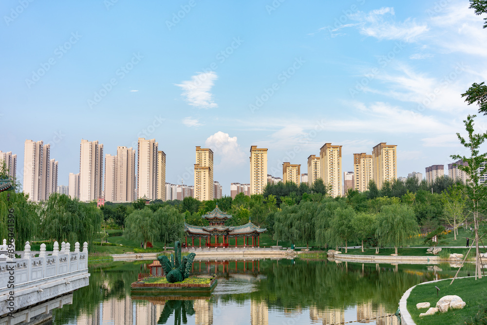 Fototapeta premium Twin Pagodas of Yongzuo Temple in Taiyuan, Shanxi: Twin towers with surrounding buildings