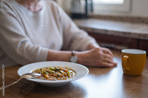 woman with no food appetite. anorexia symptoms, food poisoning  photo