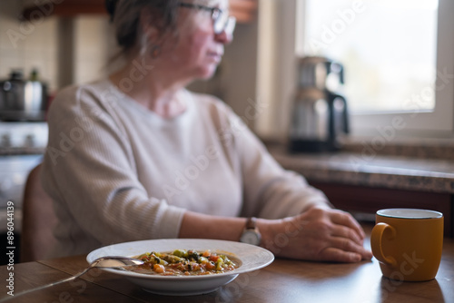 woman with no food appetite. anorexia symptoms, food poisoning 