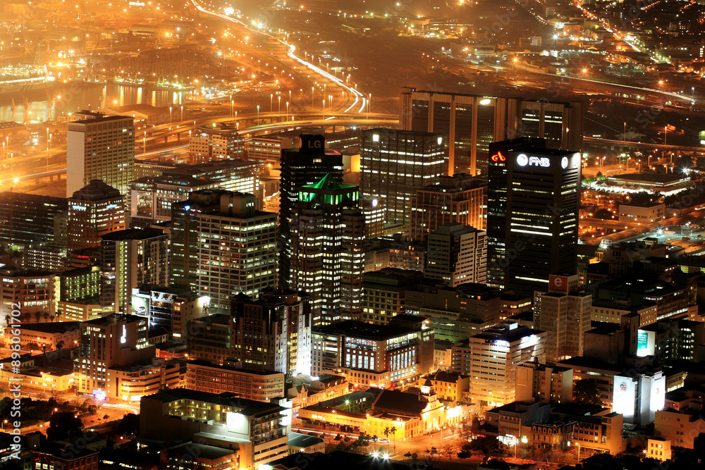 Aerial view of illuminated downtown Cape Town at night, Western Cape, South Africa. Aerial view of illuminated downtown Cape Town at night, Western Cape, South Africa.