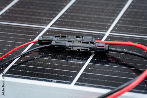 фотографія Close up of  mc4 connectors over the solar panel.
