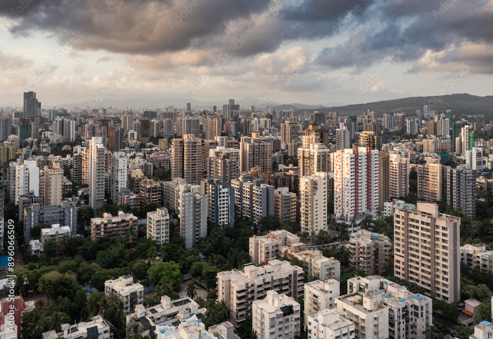 Aerial view of dense residential metropolitan city center with skyscrapers, Mumbai, India. Aerial view of dense residential metropolitan city center with skyscrapers, Mumbai, India.