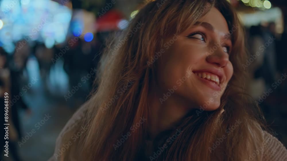 Tourist enjoy festive market at night smiling camera closeup. Happy girl dancing Tourist enjoy festive market at night smiling camera closeup. Happy girl dancing