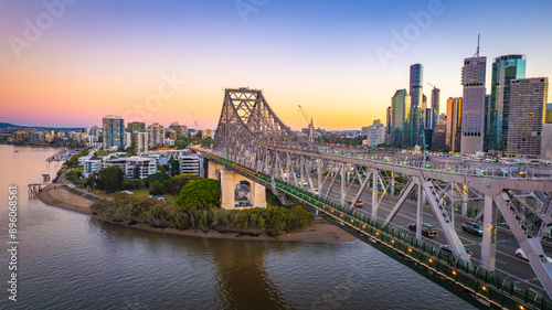 Aerial view of Brisbane city skyline at sunset with Story Bridge and Brisbane River, Brisbane City, Queensland, Australia.