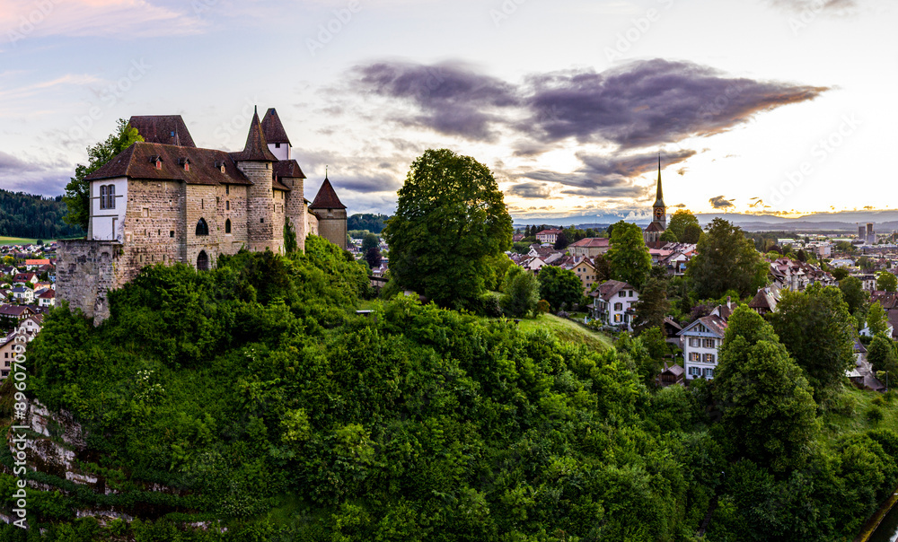 Aerial view of Castle Burgdorf with medieval fortress, hilltop village, and scenic greenery, Burgdorf, Switzerland. Aerial view of Castle Burgdorf with medieval fortress, hilltop village, and scenic greenery, Burgdorf, Switzerland.