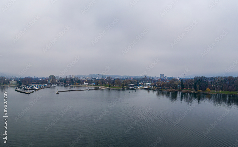 Aerial view of Harbour Biel with boats, water, buildings, trees, Biel, Switzerland. Aerial view of Harbour Biel with boats, water, buildings, trees, Biel, Switzerland.