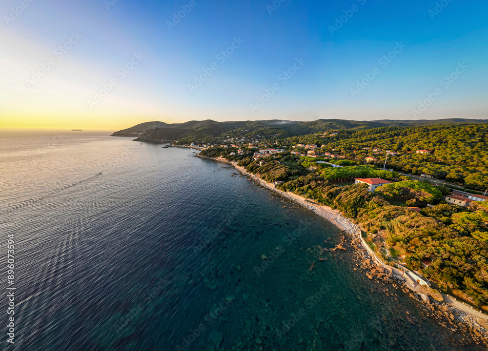 Aerial view of tranquil coastal town Quercianella, Toscana, Italy. Aerial view of tranquil coastal town Quercianella, Toscana, Italy.