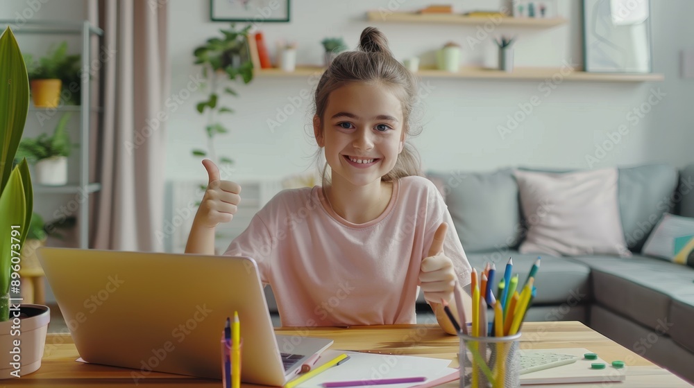 The girl with laptop at desk