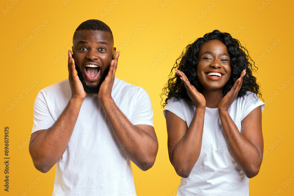 Emotional Black Couple Touching Cheeks On Yellow Background, panorama Emotional Black Couple Touching Cheeks On Yellow Background, panorama