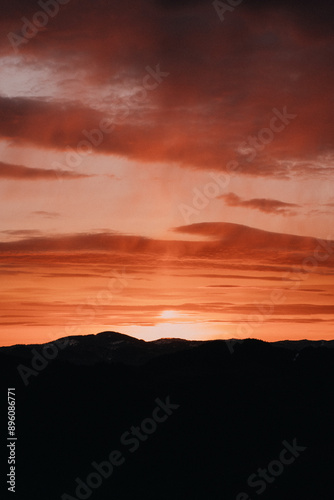 Stunning Red Sunset Over Mountain Landscape