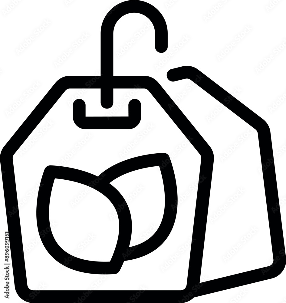 Fototapeta premium Two tea bags hanging, representing herbal infusion and promoting a healthy lifestyle