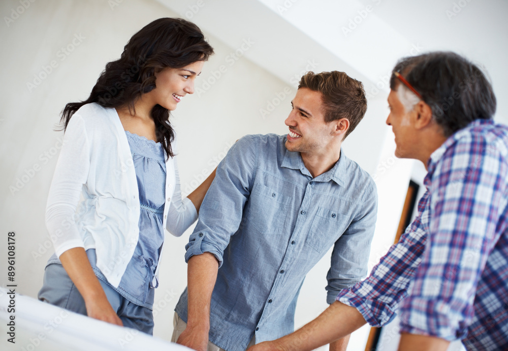 Teamwork, builder or happy couple planning blueprint for construction, sketch or talking for new home. Smile, architecture and people with model design for civil engineering, building and project Teamwork, builder or happy couple planning blueprint for construction, sketch or talking for new home. Smile, architecture and people with model design for civil engineering, building and project