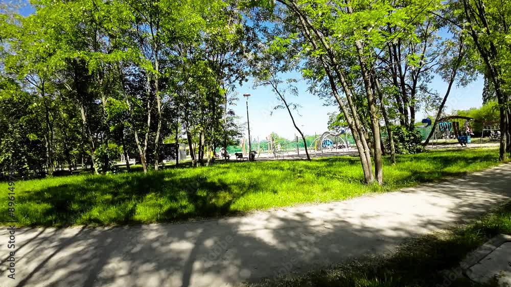 Immerse yourself in the beauty of nature with this captivating video of a stroll through a picturesque park. The lush green trees, vibrant flowers, and tranquil atmosphere create a serene and relaxing Immerse yourself in the beauty of nature with this captivating video of a stroll through a picturesque park. The lush green trees, vibrant flowers, and tranquil atmosphere create a serene and relaxing
